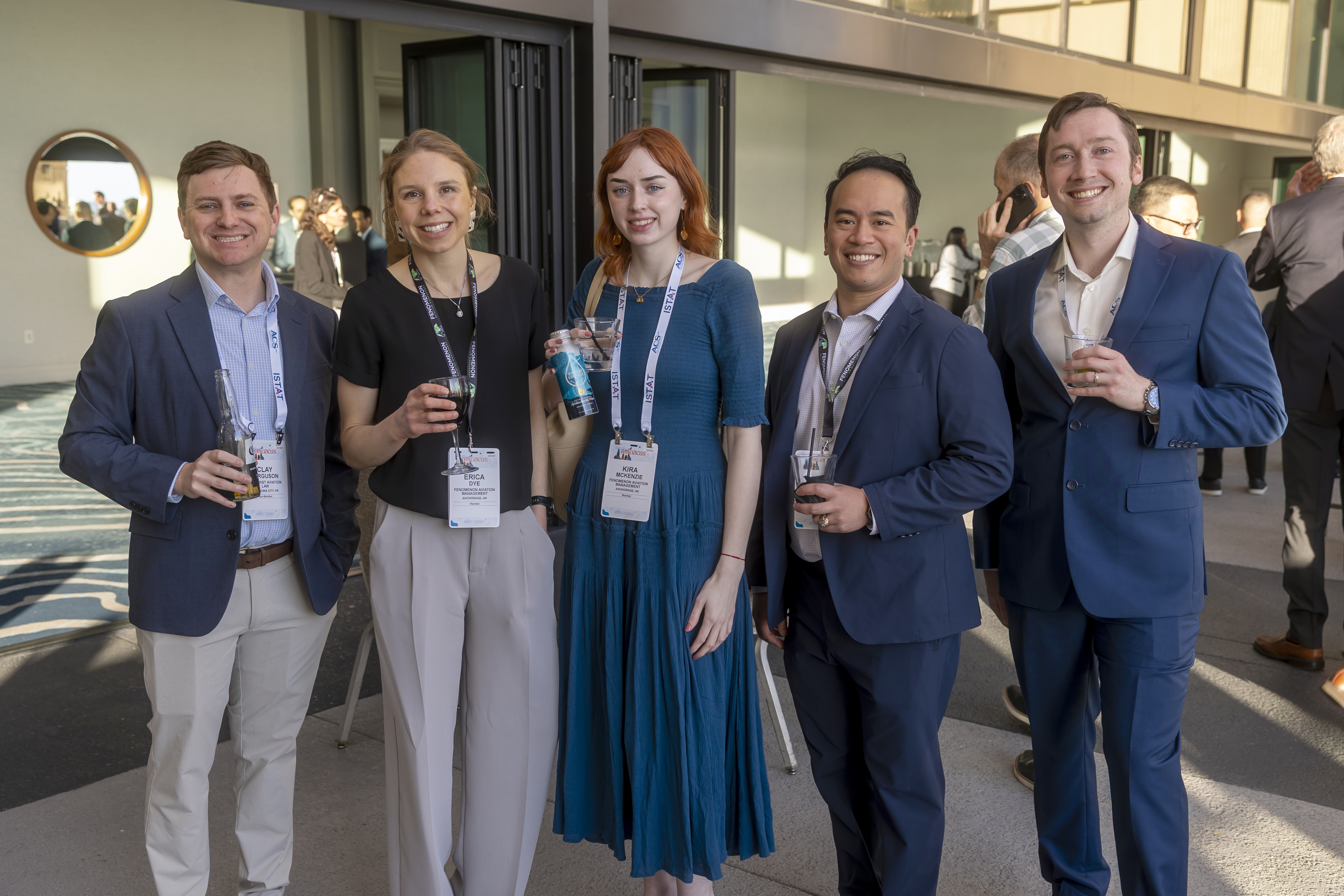 Group of first-time attendees at ISTAT Americas 2026 standing and smiling at the camera